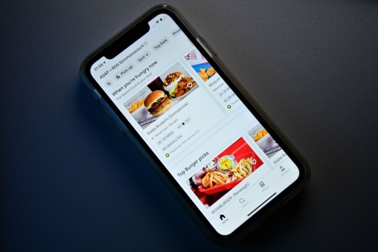 A photograph arranged as an illustration in Brenchley, south-east England on August 18, 2020 shows the Uber Eats app on a smart phone. (Photo by BEN STANSALL / AFP) (Photo by BEN STANSALL/AFP via Getty Images)